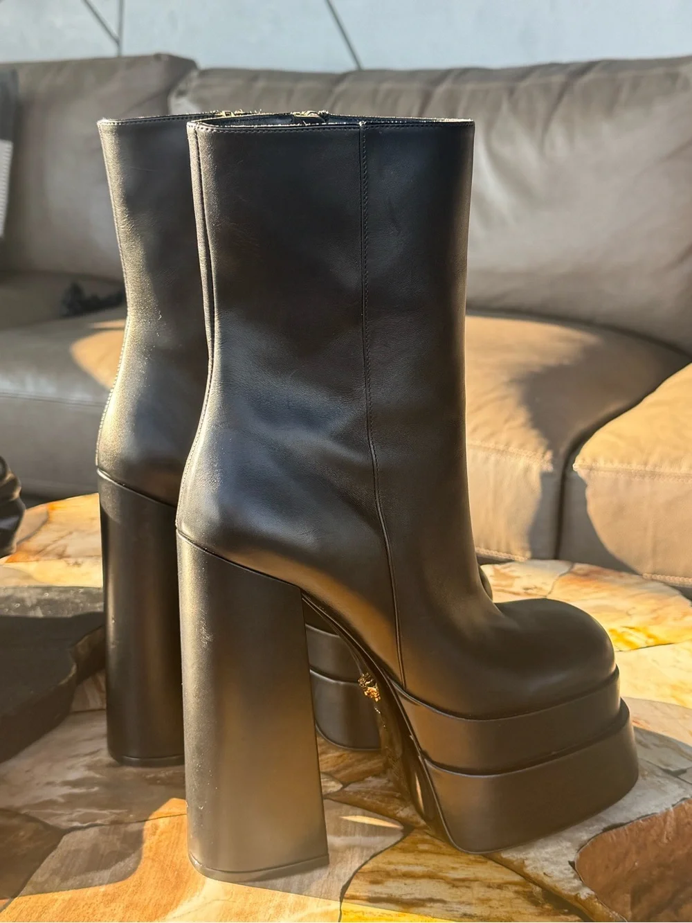 Versace Black Leather Platform Ankle Boots with Gold Accents